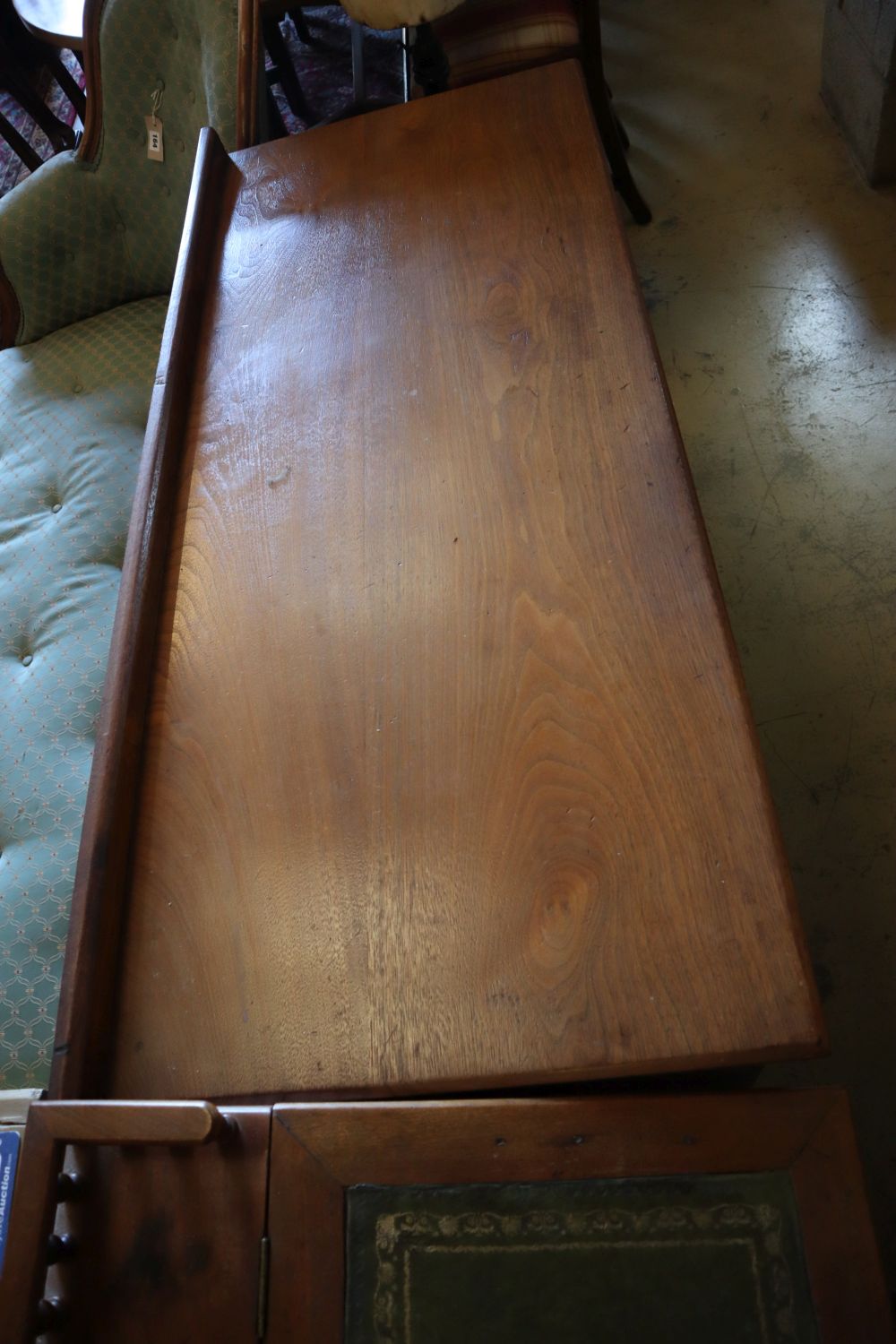 An early 20th century walnut kneehole desk, width 121cm, depth 52cm, height 78cm
